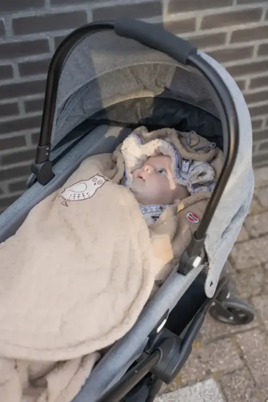 Guļammaiss bērnu ratiem Lodger Bunker Fleece beige ar bērnu kulbā