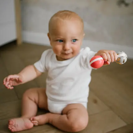 Grabulītis Babyono 1592 mazulim rokās